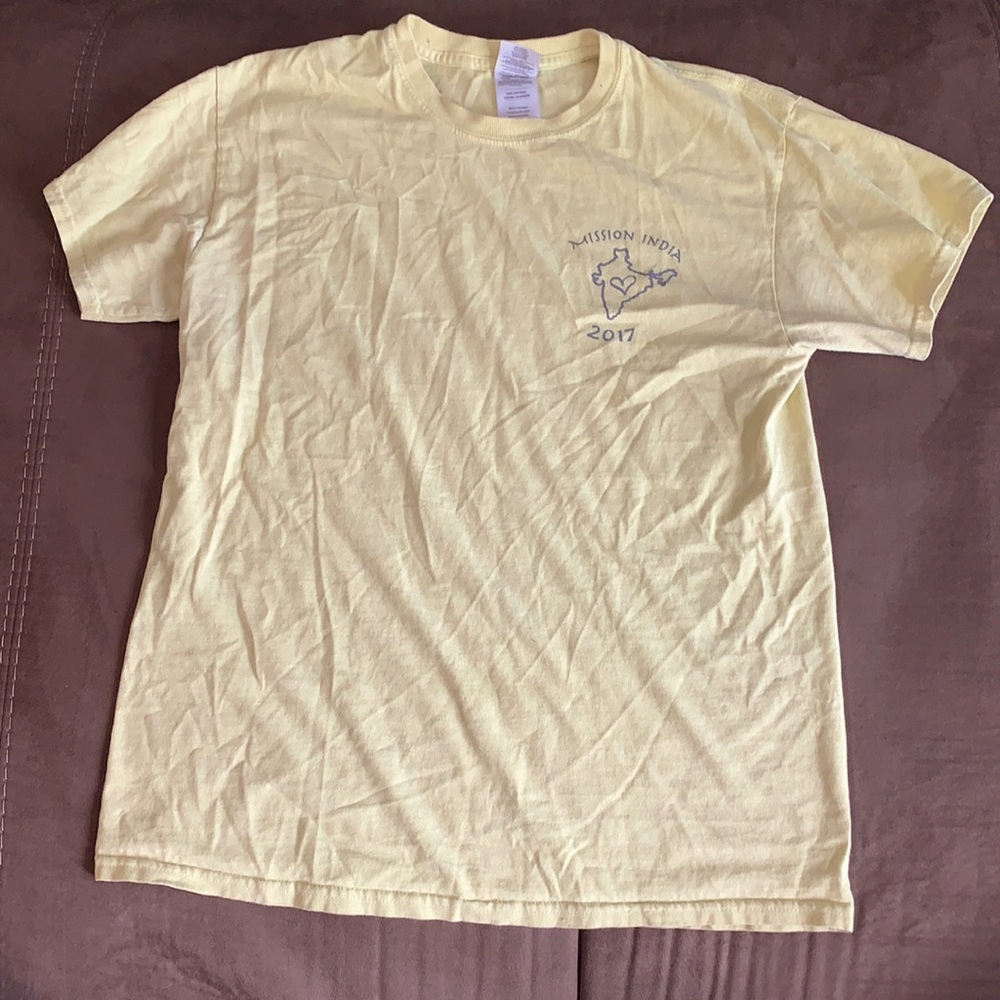 Yellow mission India shirt, supporting elephants in India.